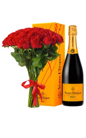 Red roses and champagne elegantly arranged in a yellow box, creating a romantic and luxurious gift presentation.